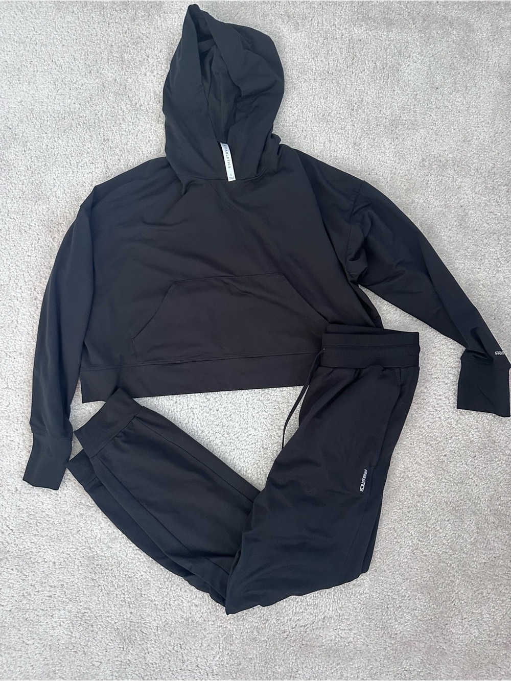 Fabletics Women’s Cloud Jersey Cropped Hoodie and Jogger Set in Black